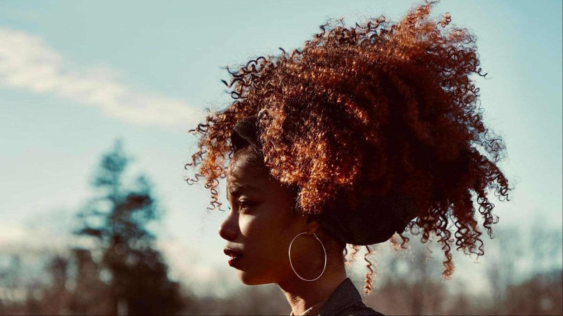 How to rock an updo if you have curly hair
